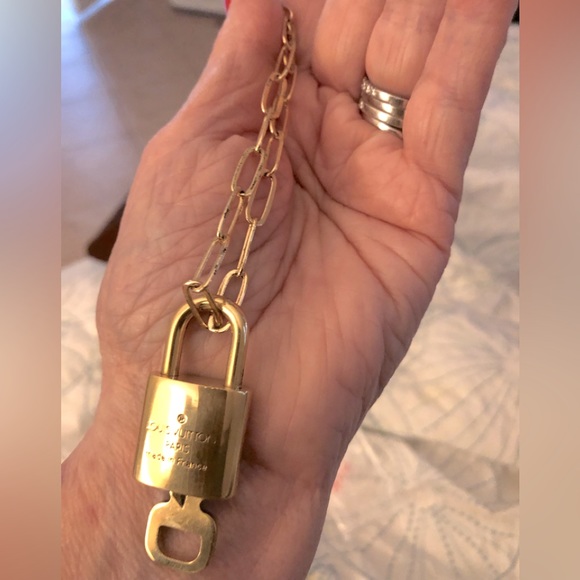 Louis Vuitton Lock & key # 310. Comes on 16” necklace. Looks NEW! - Picture 3 of 5